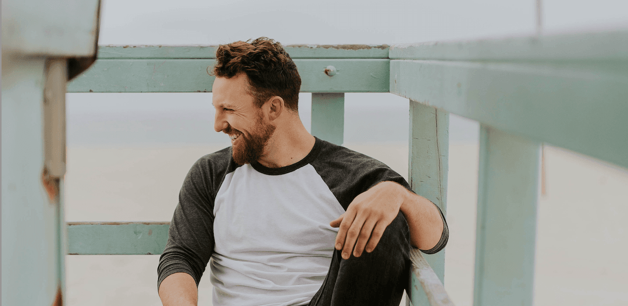 man sitting on porch
